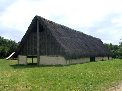 An Early Neolithic long house c 4000 cal BC reconstruction (in France) of the type of house being built at the time of the first people who used stone axes.